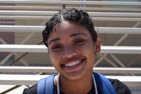 Malasja Goode smiles for the camera after being interviewed the day of Senior Checkout. Draped around her neck is a cord she received that day.
