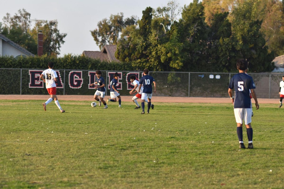 La Sierra Soccer boys are ready to take on Hemet High School, attempting to make a run for the first goal of the game.

12/8/23  Written and photographed by Valeria Aguayo
