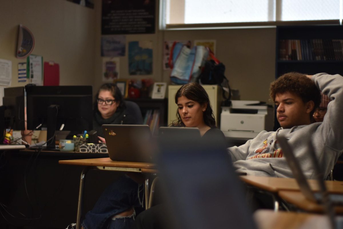 Ms. Hernandez, Naomi Cardona Gonzalez (12) and Makai Collins (12) work individually on persuasive writing. Throughout the week, Ms Hernandezs students studied on the classical pattern of persuasion.

1/23/24  Written and photographed by Alexa Lamas