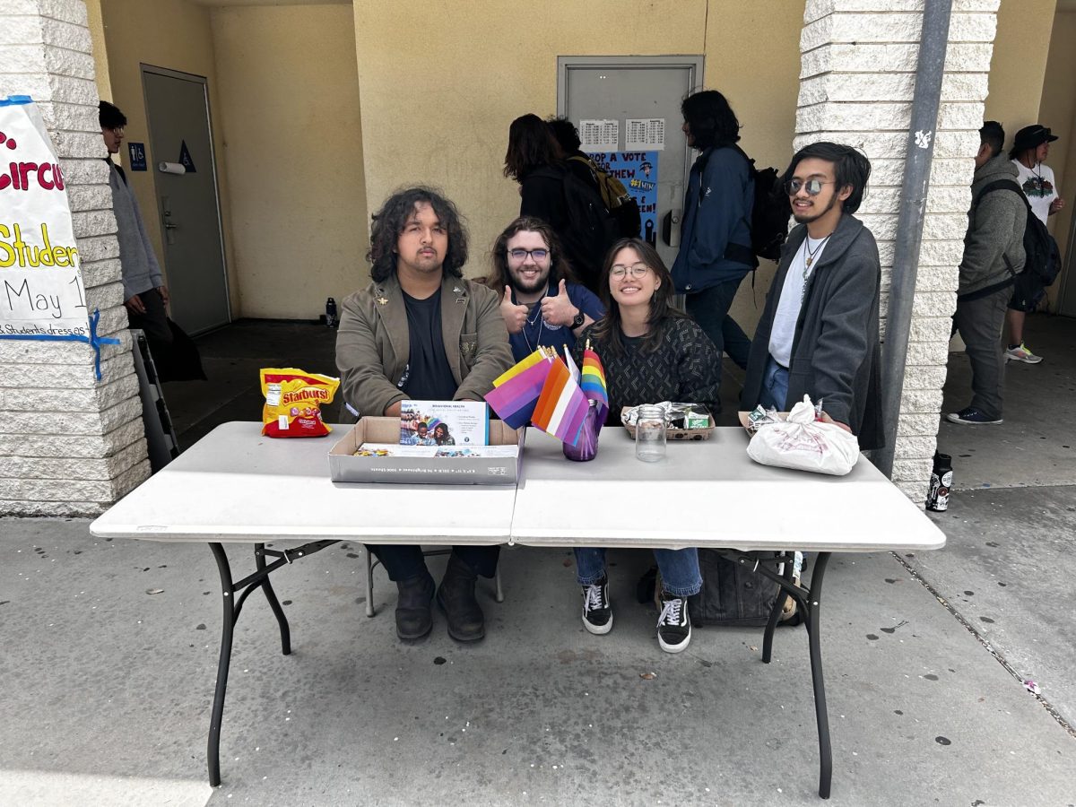 Acceptance Club during Pride Week giving out information.